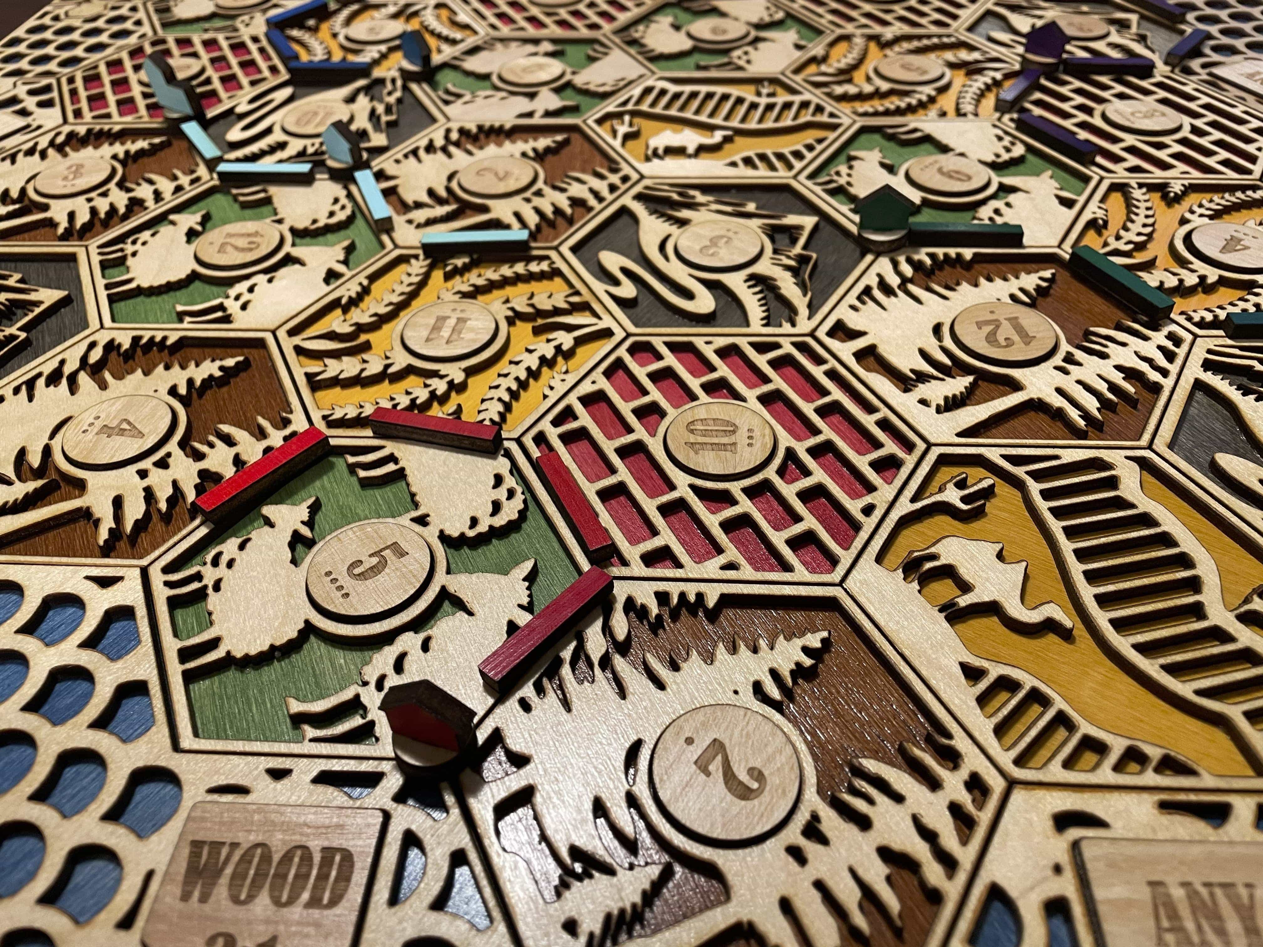 Two-layer custom Catan board laser engraved with intricate details